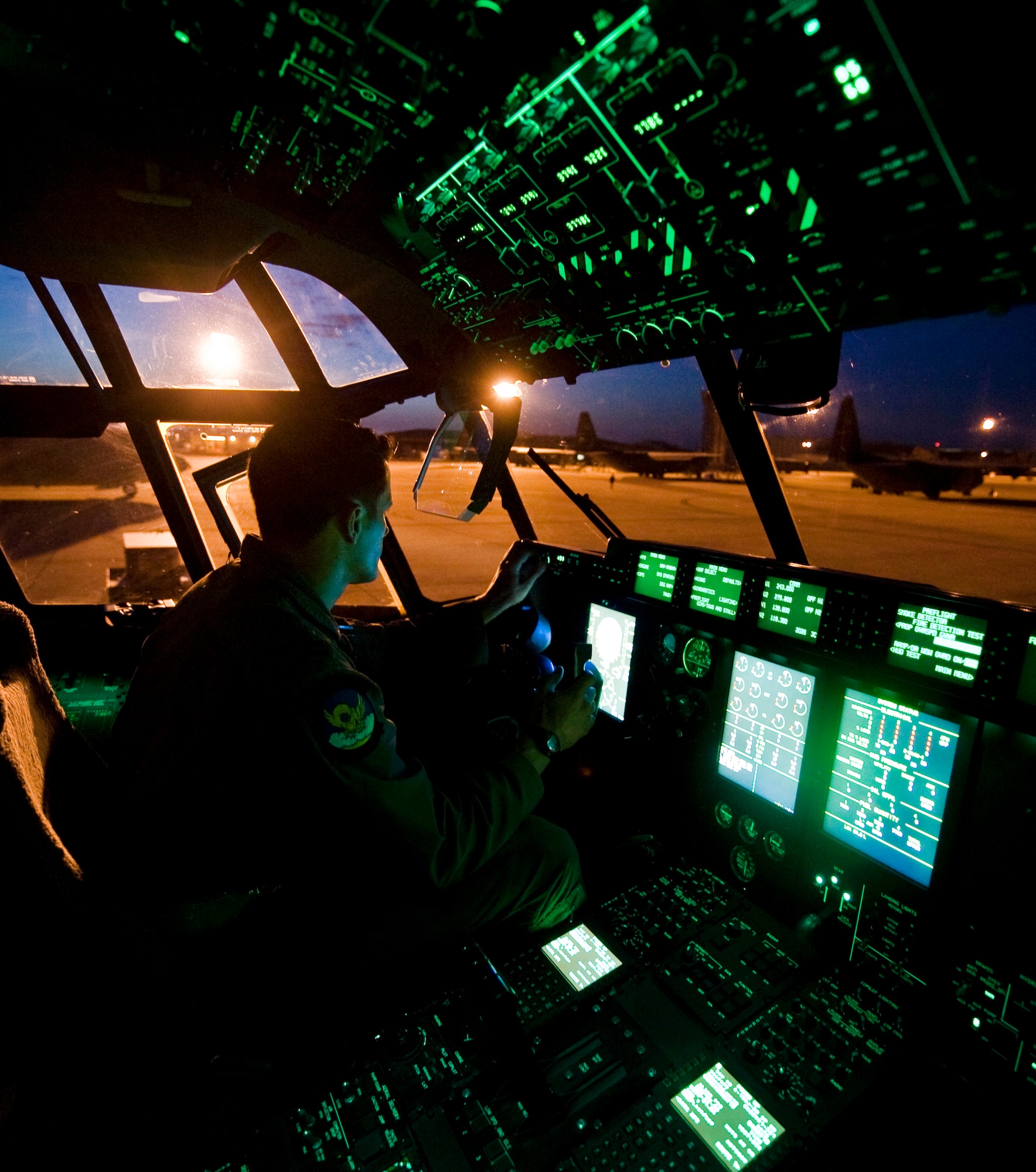 U.S. Air Force Capt. Jonathan Ferricher, 39th Airlift Squadron, prepares a C-130J for flight June 4, 2013, at Dyess Air Force Base, Texas. The Denton Amendment allows the U.S. military aircraft to transport, on a space-available basis, humanitarian supplies from non-government organizations to people around the world who are in need of assistance.  The 317th Airlift Group transported the supplies to Pope Army Airfield, N.C., where it will be taken to Joint Base Charleston Air Base, S.C., and then to Afghanistan. The supplies were donated by Global Samaritan Resources.  (U.S. Air Force photo by Senior Airman Jonathan Stefanko/Released)