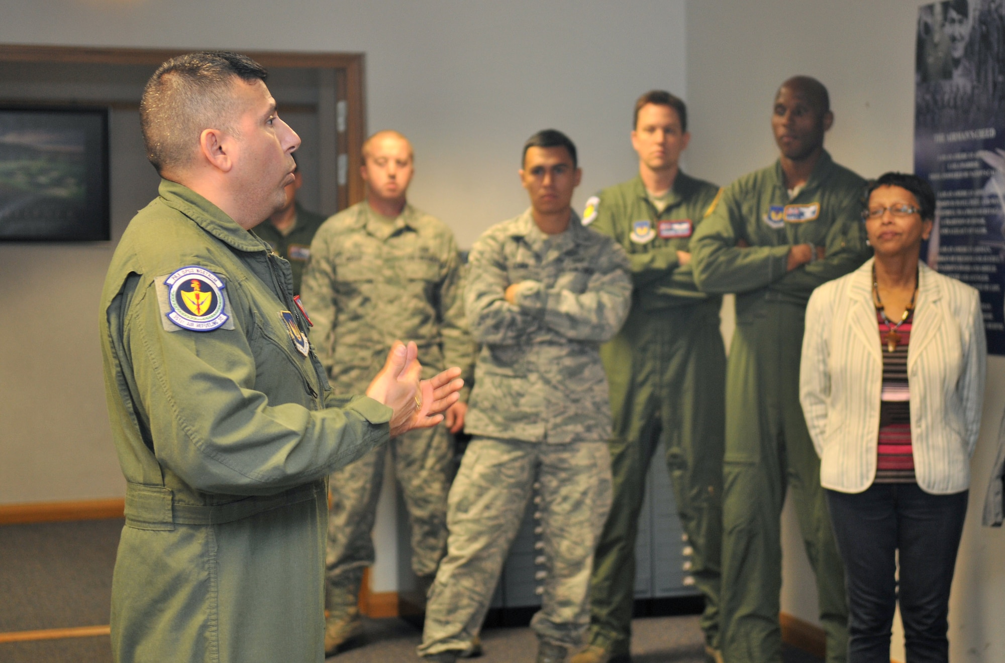 Master Sgt. Michael Rodriguez, 351st Air Refueling Squadron operations superintendent from Victoria, Texas, congratulates the 351st ARS team for winning the Senior Master Sgt. Albert L. Evans Outstanding Refueling Section of the Year award June 11, 2013, at RAF Mildenhall, England. The distinguished award recognizes the best boom operator team in the Air Force. (U.S. Air Force photo by Staff Sgt. Jerilyn Quintanilla/Released)