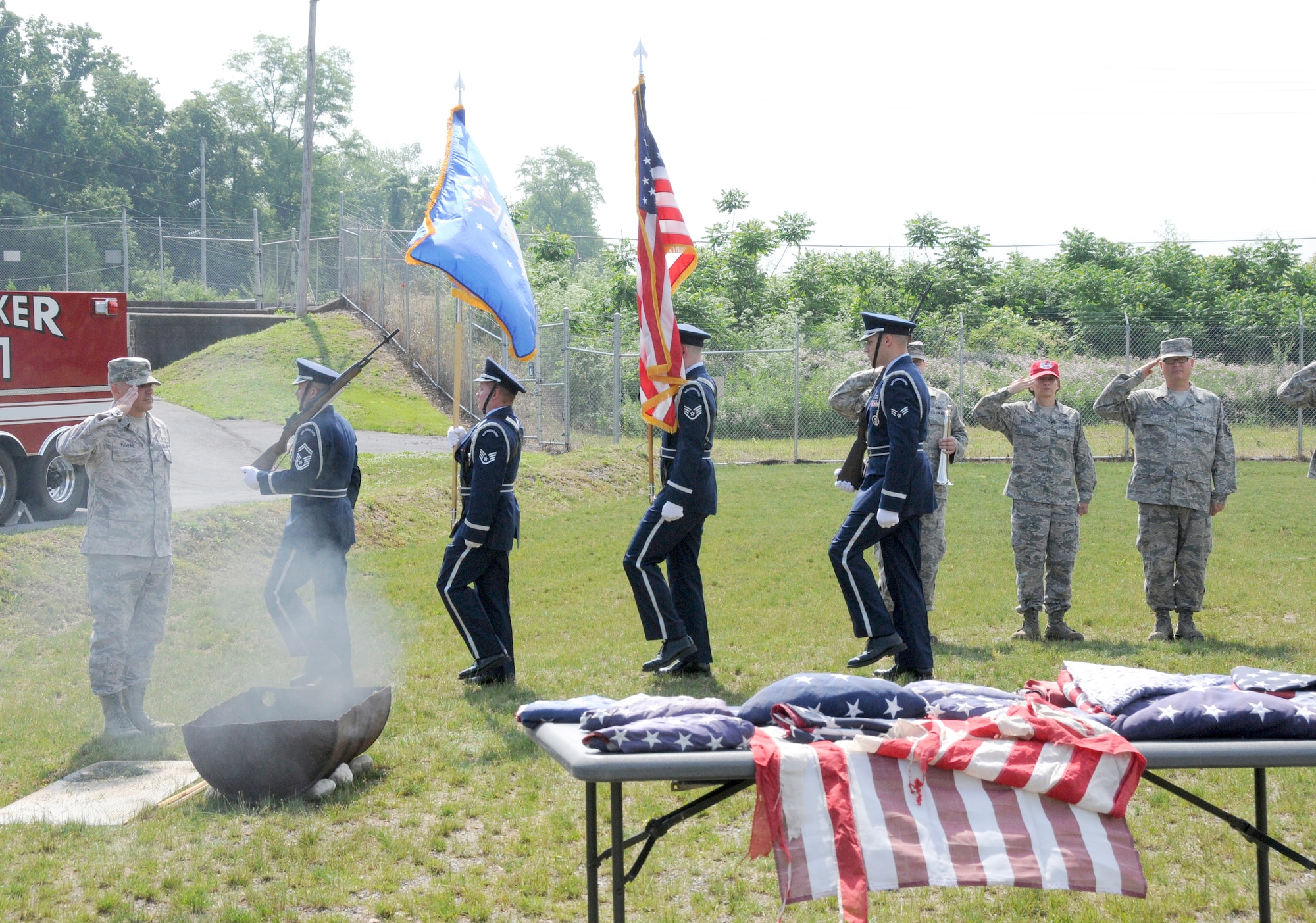 Members of the 193rd Special Operations Wing render a salute and the Base Honor Guard retires the Colors during a flag retirement ceremony held on base June 9. (U.S. Air National Guard photo by Staff Sgt. Susan Penning/Released) 