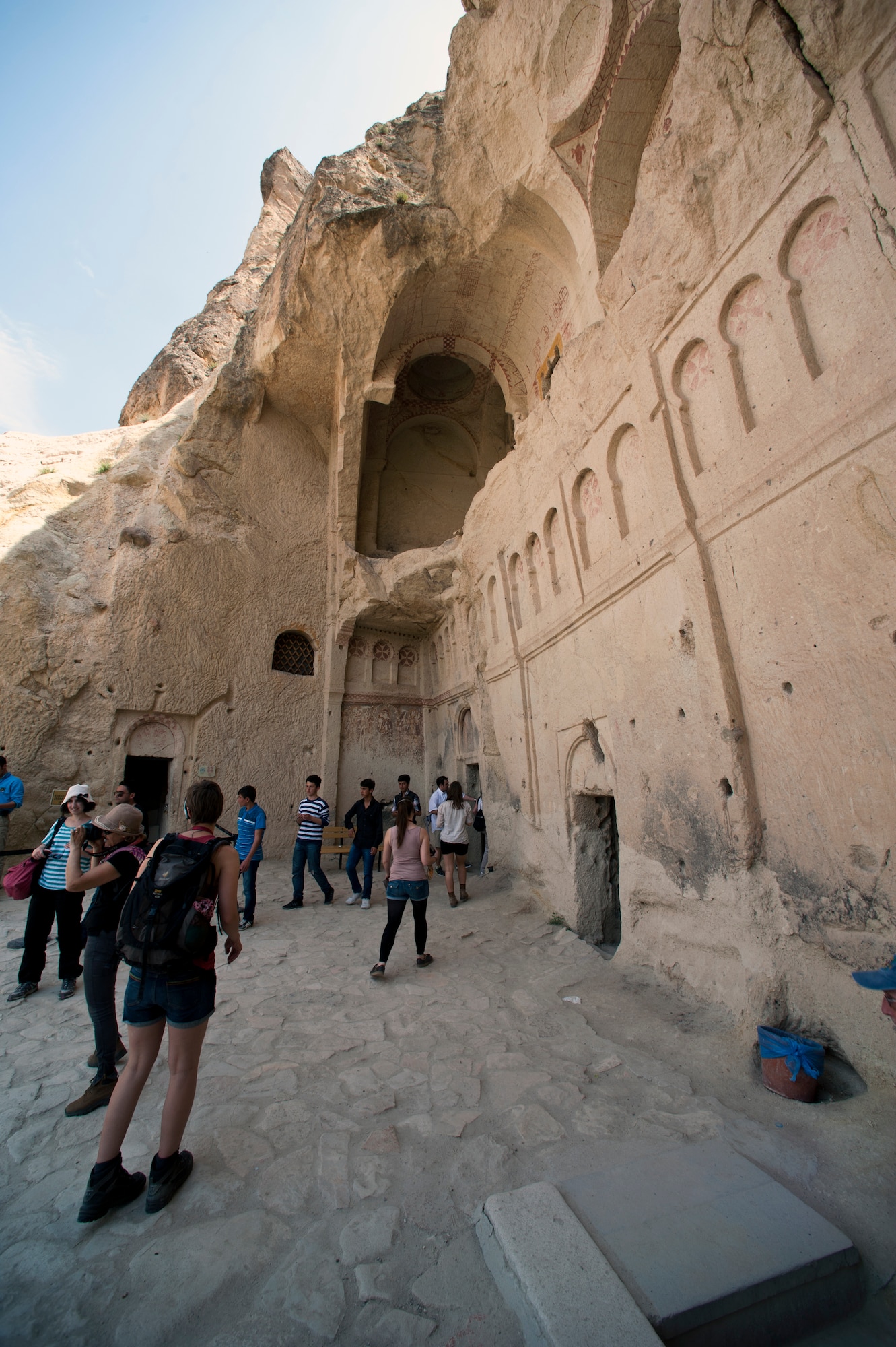 Visitors to Goreme Open Air Museum line up to go into the Dark Church May 5, 2013. The Dark Church gets its name from the tiny window that allows little light into the sanctuary. Due to the absence of light, the colors of the frescos inside are still vivid. (U.S. Air Force photo by Senior Airman Daniel Phelps/Released) 