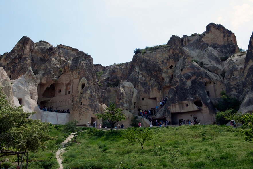 Visitors wander in and out of the churches and homes of the Goreme Open Air Museum May 5, 2013, at Goreme, Turkey. Goreme Open Air Museum resembles a vast monastic complex composed of several churches. The museum has been a member of the United Nations Educational, Scientific and Culture Organization’s World Heritage Sites since 1984. (U.S. Air Force photo by Senior Airman Daniel Phelps/Released)