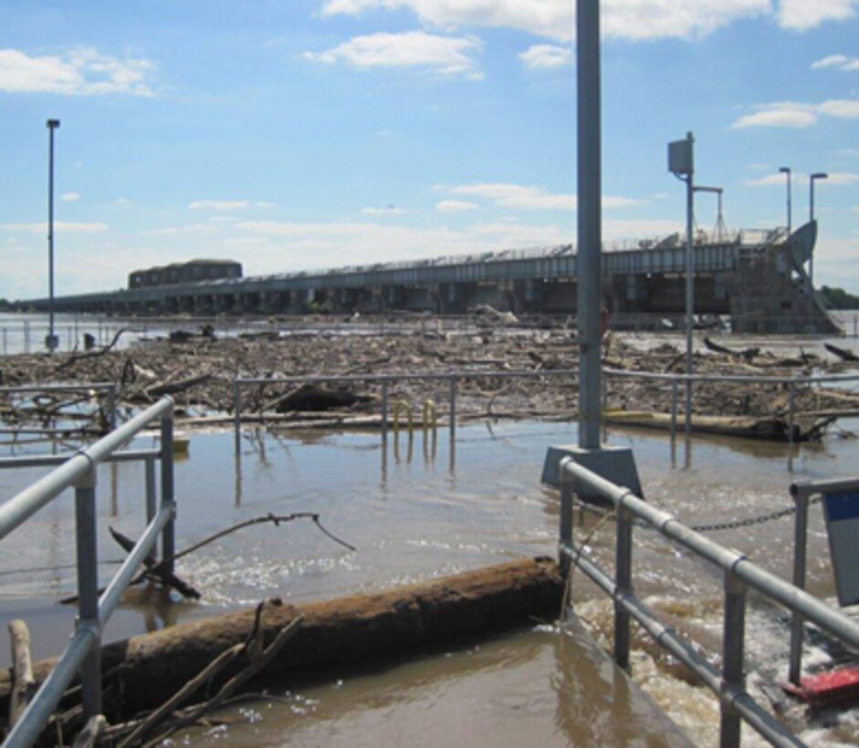Debris accumulates at Lock and Dam 20 on the Mississippi River June 3. Lock 20 was closed to navigation for 12 days due to water overtopping the lock gates.