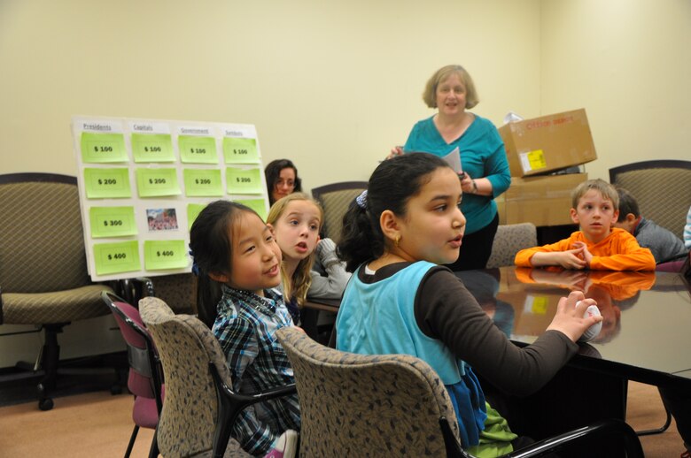 Children playing "Office of Counsel Jeopardy” that was co-presented by Ellen Simon, assistant District counsel.