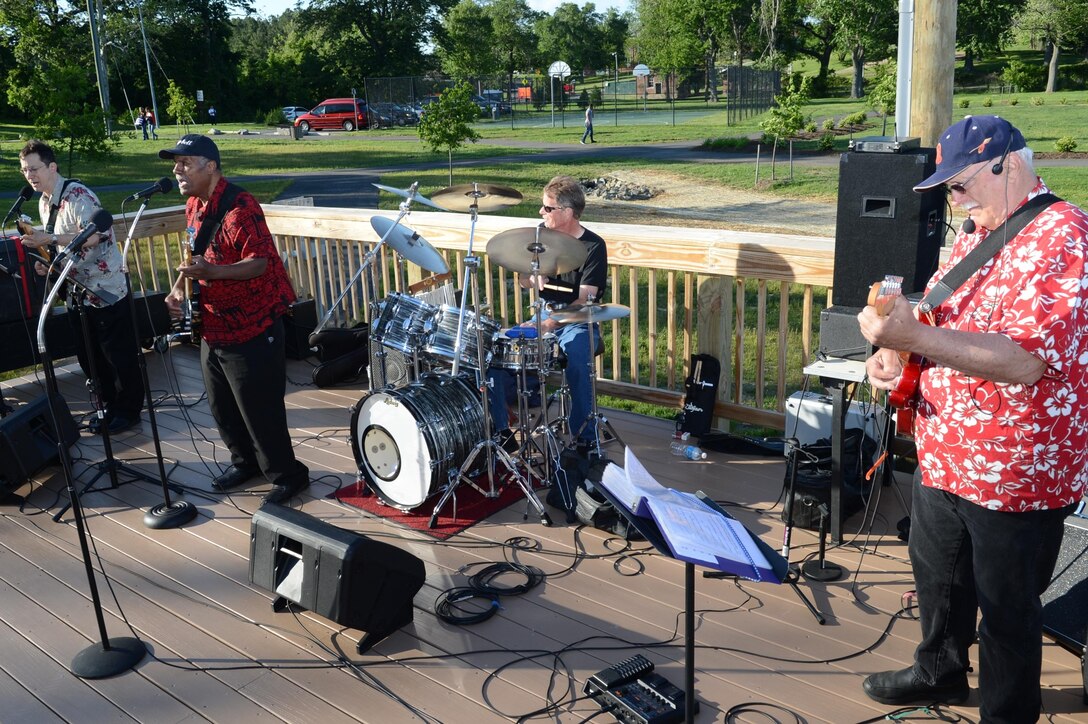 The Sasparilla Band plays a few old school jams for the residents aboard Marine Corps Base Quantico during the Town of Quantico’s 2013 Summer Music Concert Series at the town's Municipal Park on May 25, 2013. There are two other concerts scheduled to be held at the park later this summer.