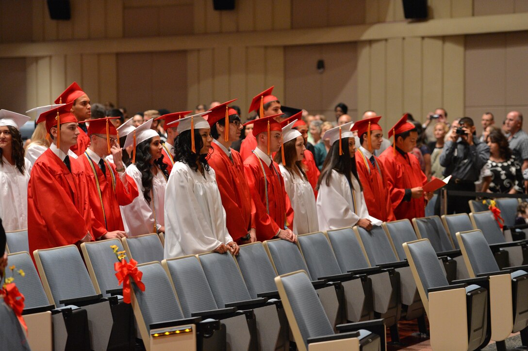 The Quantico Middle/High School’s 2013 graduating class waits to be seated at the start of their graduation ceremony at Little Hall’s theatre on June 7, 2013. There were 21 Quantico students in the graduating class.