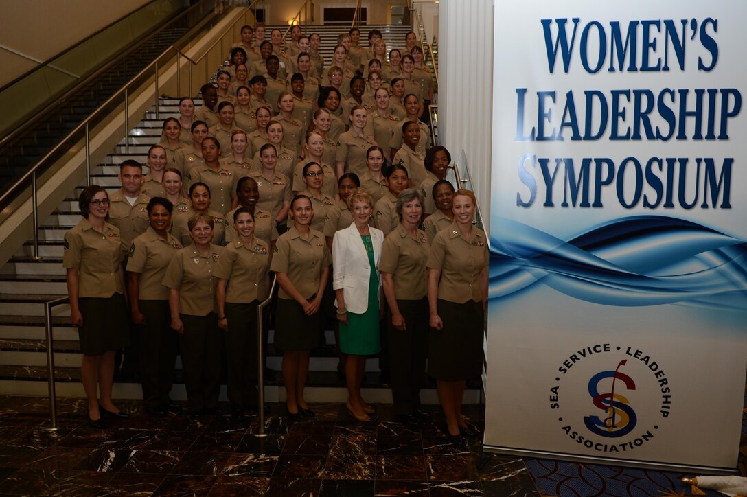 Approximately 75 Marines gathered for a group photo during the 2013 Joint Women’s Leadership Symposium at the Gaylord National Resort and Convention Center in Washington, D.C., on June 6-7, 2013. Bonnie Amos, wife of Commandant of the Marine Corps Gen. James Amos and the only civilian pictured, was a special speaker during the Marine’s breakout session June 7.