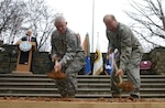 Army Lt. Gen. Clyde Vaughn, left, director of the Army National Guard, and Air Force Gen. Craig McKinley, chief, National Guard Bureau, ceremonially break ground on the expansion project of the Army National Guard Readiness Center in Arlington, Va., Wednesday, Dec. 10, 2008. The project is scheduled for completion in 2011 and will allow the consolidation of several facilities in northern Virginia.