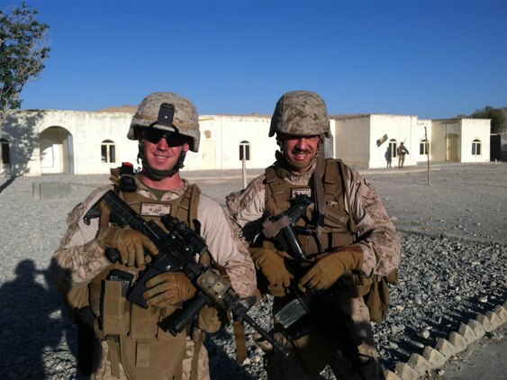 Major Matthew Winkelbauer, the Civil Affairs Detachment officer-in-charge with Regimental Combat Team 7, and Capt. Wesley Viner, also with the Civil Affairs Detachment, RCT-7, pose for a picture in Now Zad district, May 31, 2013. The detachment is comprised of 11 Marines from Camp Pendleton, Calif., and is divided into two basic parts: four Marines who work with the RCT command and seven Marines who help with the daily advising of local government officials throughout Helmand province.