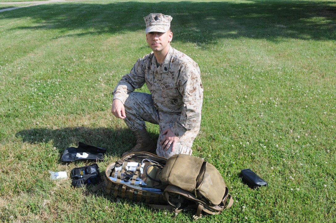 Chief Petty Officer Sean Newman happened to have his medical supply bag with him when a pickup truck ahead of him ran off the road. His assistance on the scene earned him the Navy Achievement Medal, awarded June 7. 