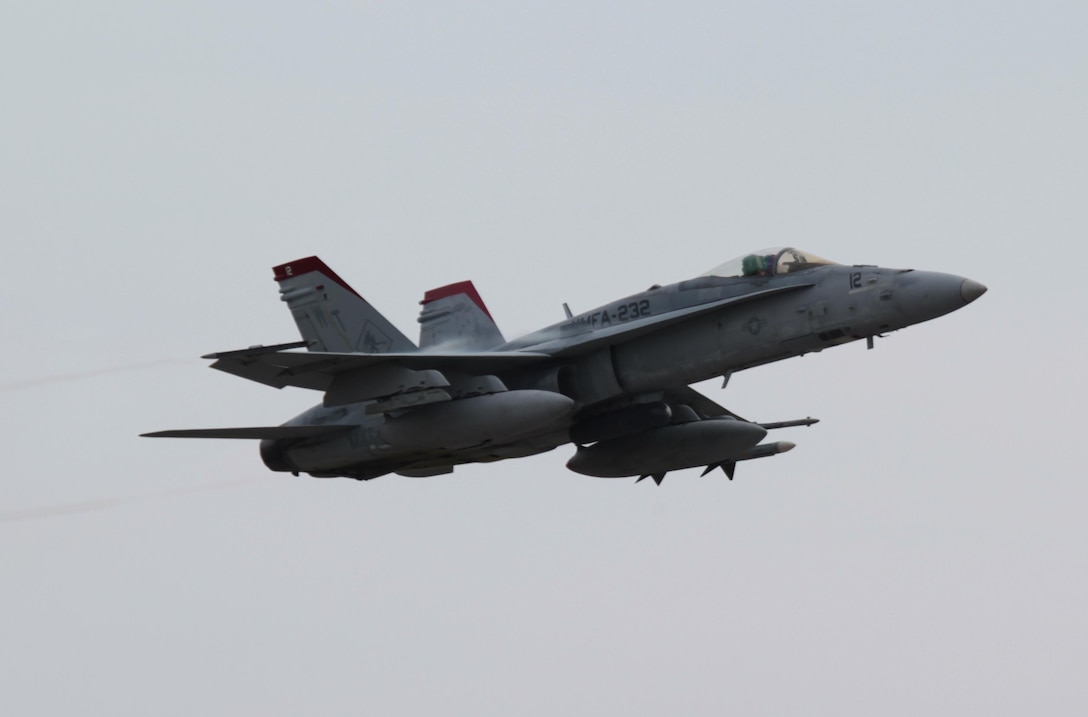 U.S. Marine Corps Capt. Christopher Prout with Marine Fighter Attack Squadron (VMFA) 232, Marine Aircraft Group 11, 3rd Marine Aircraft Wing prepares flies a F/A-18C Hornet airplane while participating in a deployment for training (DFT) on Tyndall Air Force Base, Fla., May 16, 2013. The training prepared the squadron for future combat and contingency operations. (U.S. Marine Corps photo by Sgt. Gregory Moore, 3rd MAW Combat Camera/Released)