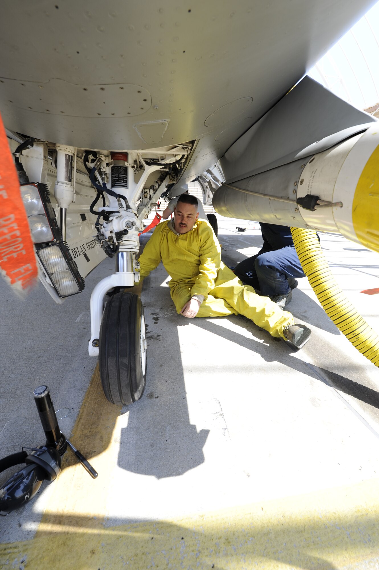 KUNSAN AIR BASE, Republic of Korea—Tech. Sgt. Chris Huffman, 4th Expeditionary Fighter Squadron, 4th Expeditionary Maintenance Unit crew chief, conducts a lube inspection on an F-16 Fighting Falcon at Kunsan Air Base, Republic of Korea, April 3, 2013. The lube inspection is done every 30 days after an aircraft has been washed. (U.S. Air Force photo by Staff Sgt. Tong Duong/released)