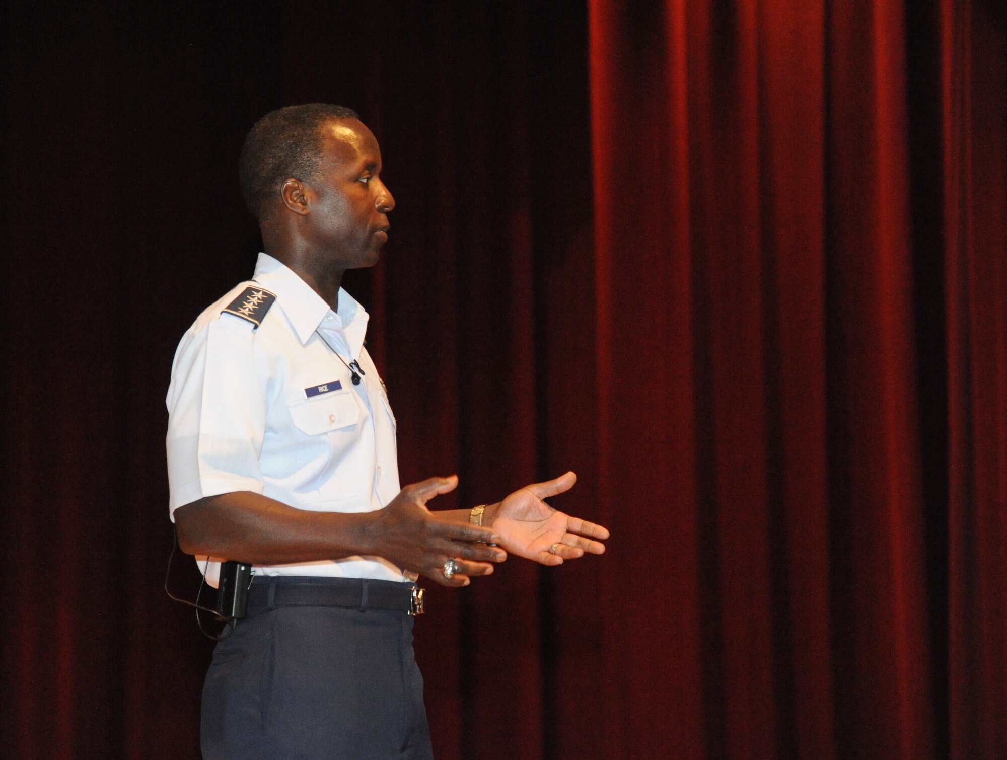 Gen. Edward Rice, Air Education and Training Command commander, speaks to Keesler personnel during an ‘all call’ June 10, 2013, at the Welch Theater, Keesler Air Force Base, Miss. Throughout a two-day visit Rice, his wife and Chief Master Sgt. Gerardo Tapia, AETC command chief, toured various facilities, spoke to various groups and held an ‘all call’ for Keesler personnel.  (U.S. Air Force photo by Kemberly Groue) 