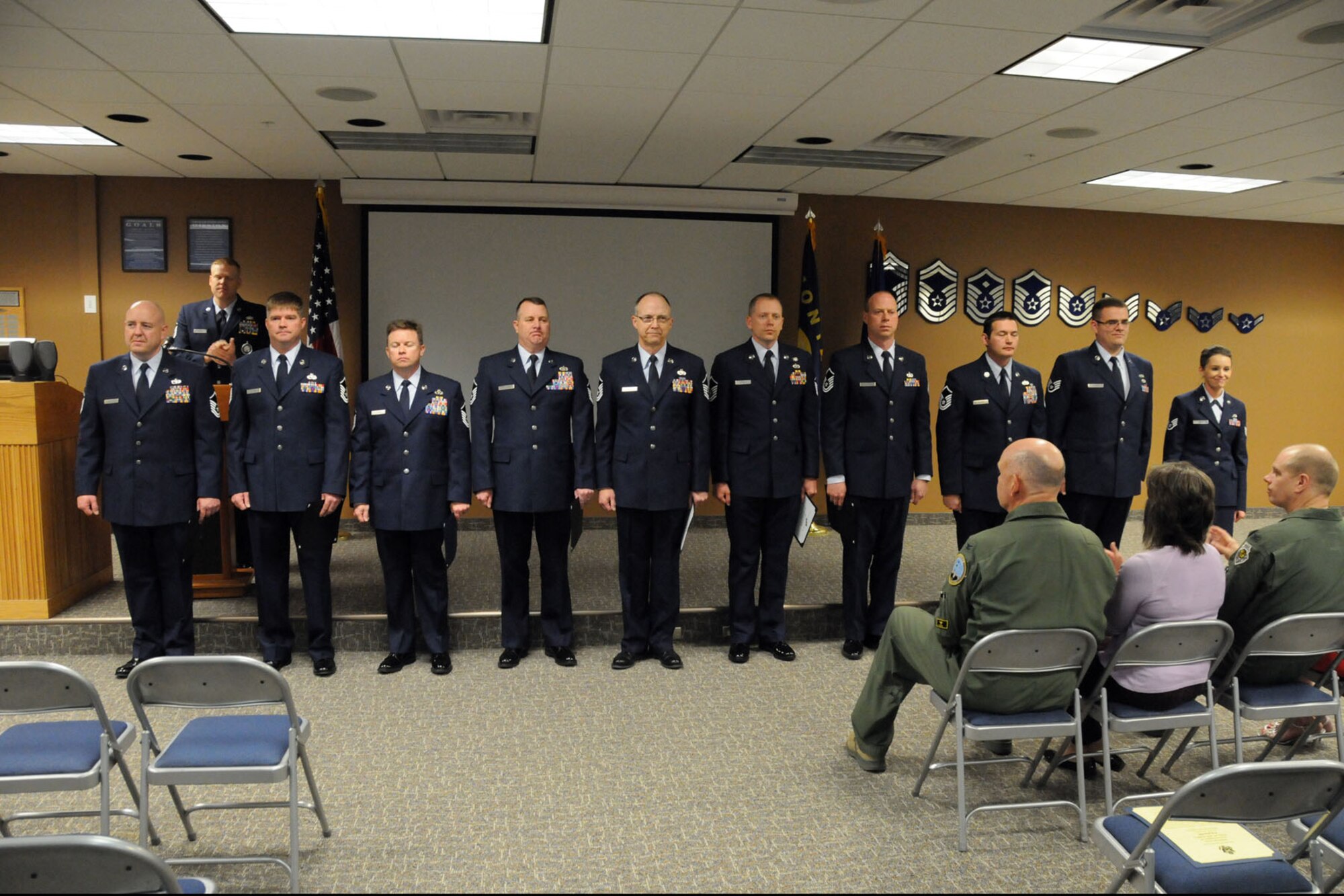 Newly inducted NCOs and senior NCOs are introduced to Wing leadership, unit members and guests during the NCO and senior NCO Induction Ceremony held at the 120th Fighter Wing on April 7. (U.S. Air Force Photo/Senior Master Sgt. Eric Peterson)