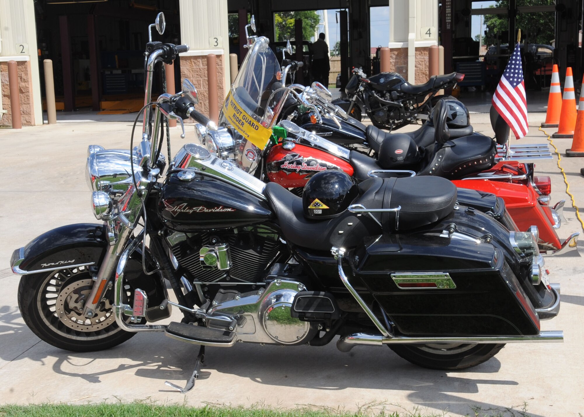 Motorcycles are displayed during the Auto Hobby Car & Bike Meet on Barksdale Air Force Base, La., June 7, 2013. The event was for auto and motorcycle enthusiasts to meet and discuss their hobbies as well as showcase their vehicles.  (U.S. Air Force photo/Senior Airman Kristin High)
