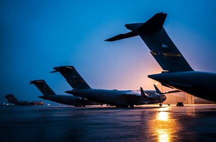 C-17 Globemaster III’s are chained on the flightline due to approaching tropical storm Andrea June 6, 2013, at Joint Base Charleston – Air Base, S.C. The storm’s projected intensity was not strong enough to warrant evacuation, but the aircraft were chained as a precaution. (U.S. Air Force photo/ Senior Airman Dennis Sloan))