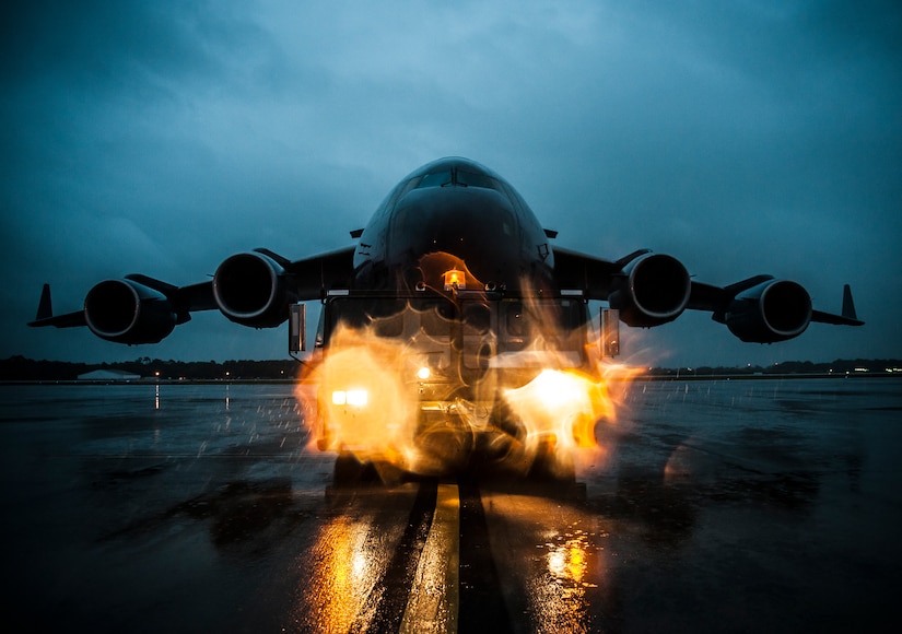 A C-17 Globemaster III is towed into position on the flightline to be chained in place due to approaching tropical storm Andrea June 6, 2013, at Joint Base Charleston – Air Base, S.C. The storm’s projected intensity was not strong enough to warrant evacuation, but the aircraft were chained as a precaution. (U.S. Air Force photo/ Senior Airman Dennis Sloan)