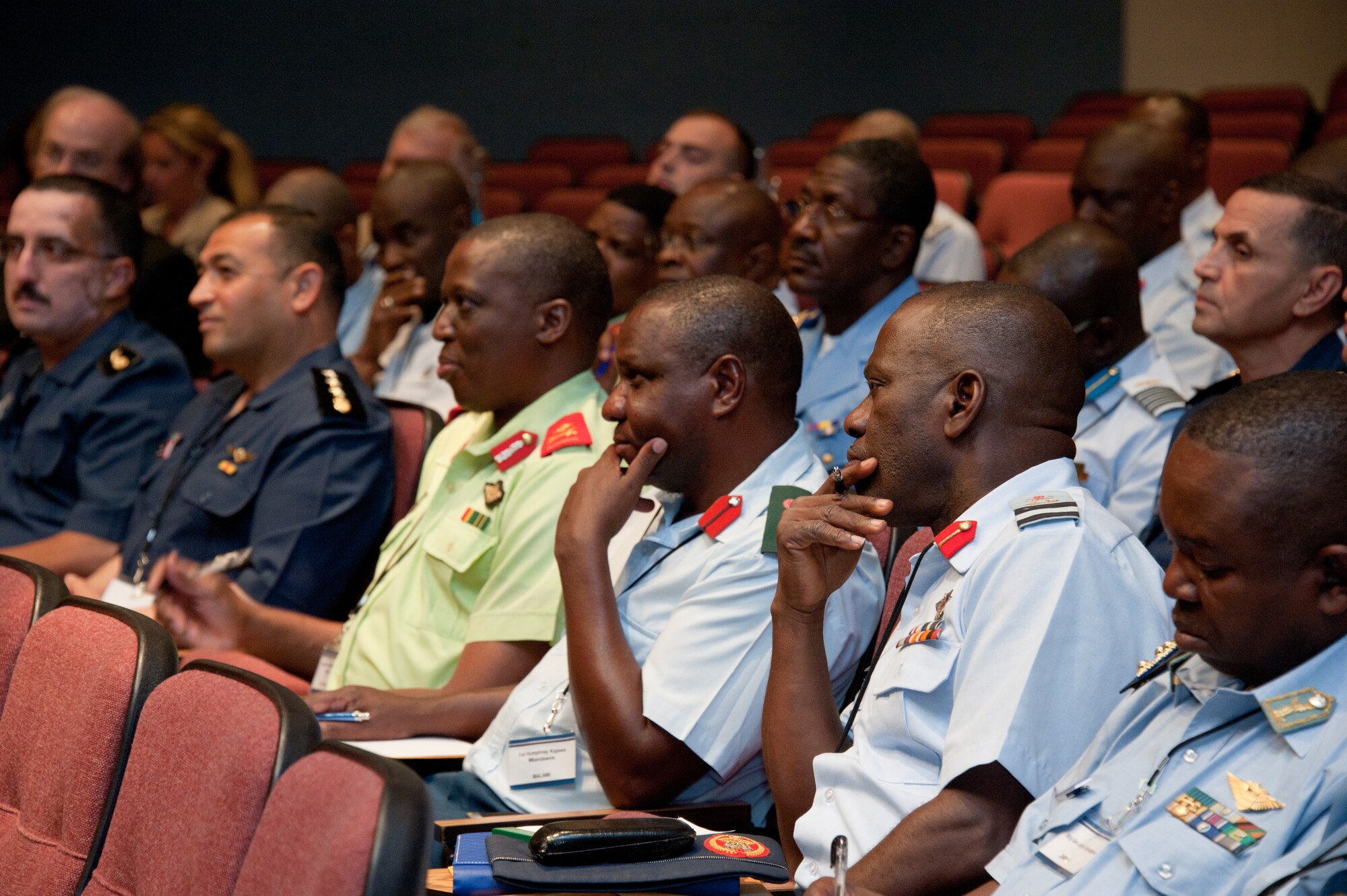 Maxwell AFB, Ala. –African officers listen to Maj. Gen Donald C. Ralph, Mobilization Assistant to the Commander, U.S. Air Forces Europe; U.S. Air Forces Africa, Commander Air Component Command, Ramstein Air Base, Germany provide the keynote address to the AFRICOM symposium attendees at Air War College, Jun 11, 2013.  The AFRICOM Symposium is an event designed to bring together military members of African nations to build relationships and partnerships with members of other African countries. Many of the attendees are previous graduates from the US Air Force's Air Command & Staff College and/or Air War College.  (US Air Force photo by Melanie Rodgers Cox/Released)