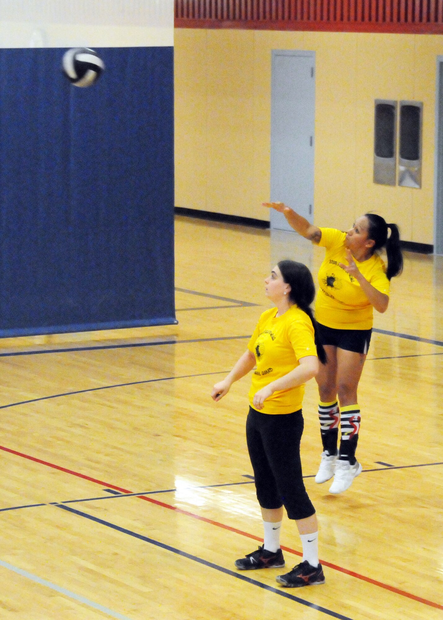 Tech. Sgt. Rhoda Bargas serves the volleyball to the opposing team during the final Montana Air National Guard Vigilantes volleyball game played during the season playoffs held at the Malmstrom Fitness Center on May 14, 2013.  (U.S. Air Force photo/Senior Master Sgt. Eric Peterson)