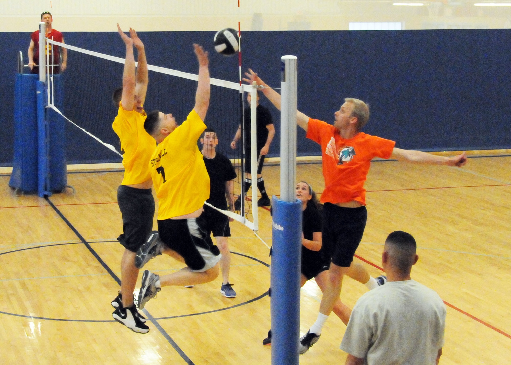 Staff Sgt. Olin McCrumb and Tech. Sgt. Stoney Jarvis jump to block a ball during the final Montana Air National Guard Vigilantes volleyball game played during the season playoffs held at the Malmstrom Fitness Center on May 14, 2013.  (U.S. Air Force photo/Senior Master Sgt. Eric Peterson)