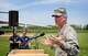 Gen. Paul Selva, Air Mobility Command commander, thanks members of the local community for the support they have given over the years during a ceremony June 11, 2013 at Scott Air Force Base Ill. The local communities were award the Abilene Trophy for their support of the base. This was the first time since the awards creation that the communities around Scott have earned the award. (U.S. Air Force photo/ Staff Sgt. Ryan Crane)