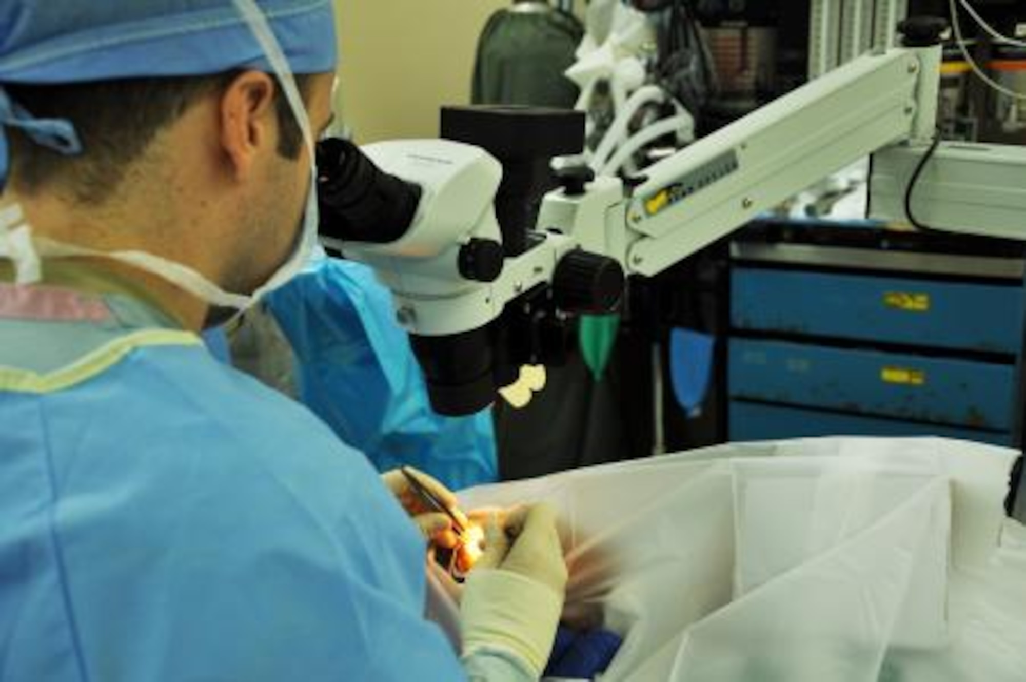 U.S. Air Force Maj. (Dr.) Richard Townley, cornea and refractive surgeon from the 59th Medical Wing at Wilford Hall Ambulatory Surgical Center at Lackland Air Force Base, Texas, performs cataract surgery on a patient June 5, 2013, at the Southern Regional Hospital in Dangriga, Belize. Military medical professionals from the U.S. and Canada have provided free medical treatment throughout Belize as part of an exercise known as New Horizons. The medical readiness training exercises are designed to provide humanitarian assistance and medical care to people throughout Belize, while helping improve the skills of U.S. military medical forces. (U.S. Air Force photo by Capt. Holly Hess/Released)


