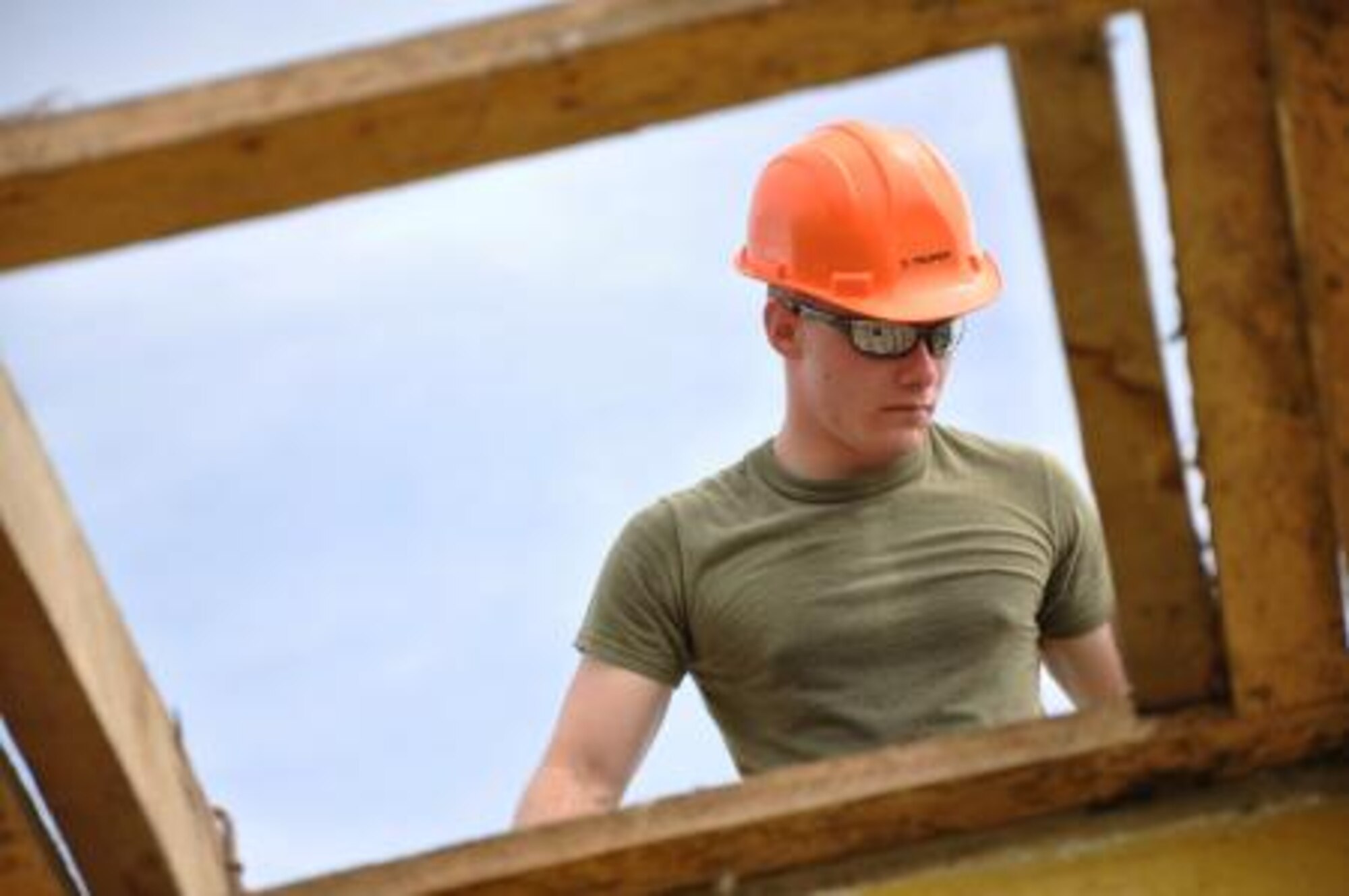 U.S. Marine Corps Lance Cpl. Lee Evans, combat engineer from the Marine Wing Support Squadron 471, works to repair a roof at Hattieville Government Pre-School June 4, 2013, as part of an exercise called New Horizons. Using excess building materials, the civil engineers plan to repair the leaky roof. Civil Engineers from both the U.S. and Belize are constructing various structures at schools throughout Belize as part of an exercise called New Horizons. Building these facilities will support further education for the children of the country and provide valuable training for U.S. and Belizean service members. (U.S. Air Force photo/Capt. Holly Hess)

