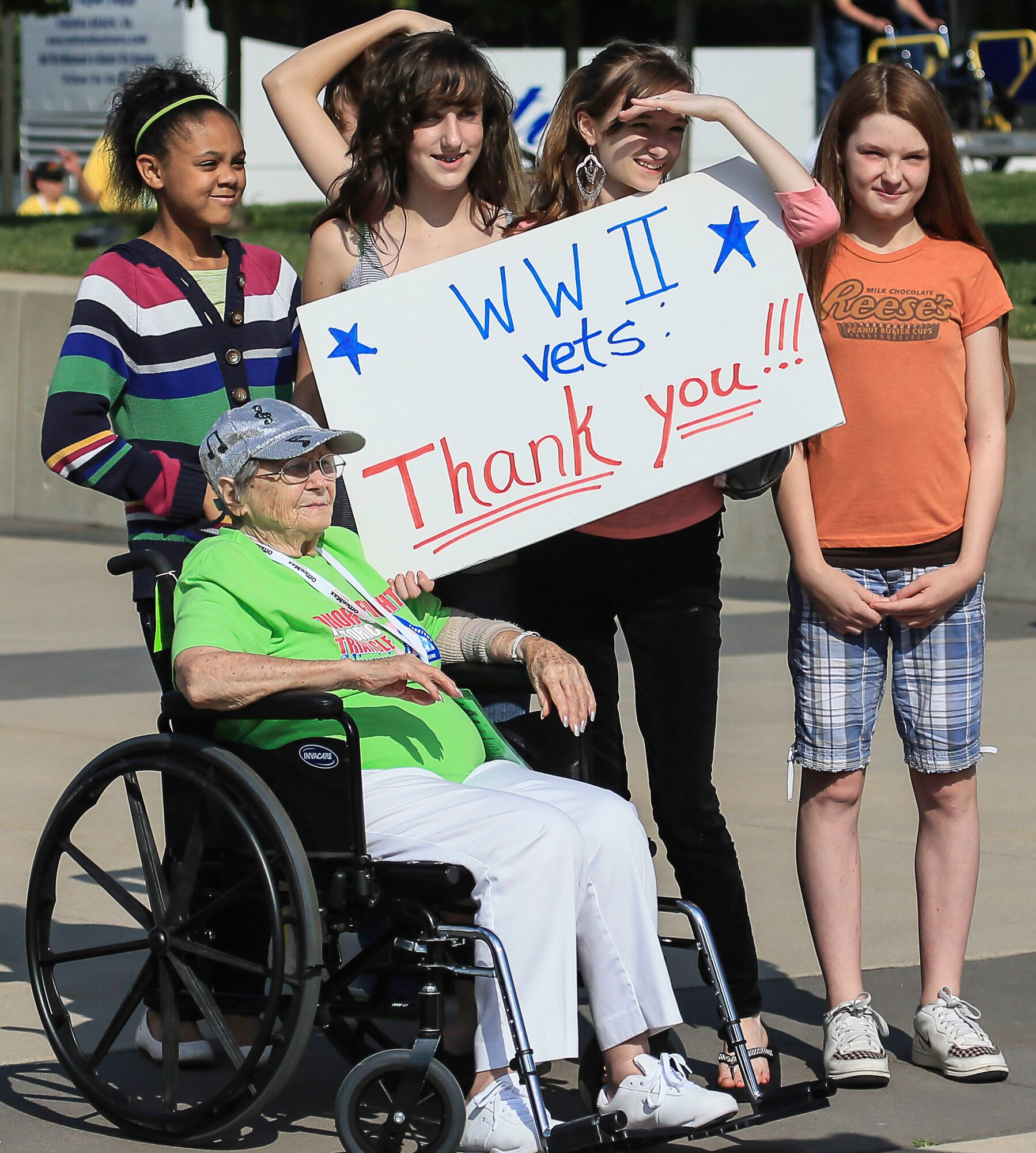 Friends and family of World War II and Korean War veterans show their appreciation for the veterans’ service in Washington, D.C., June 8, 2013. The veterans were taken as part of Honor Flight Historic Triangle Virginia to see the World War II Memorial, as well as Arlington National Cemetery, the Marine Corps War Memorial, Korean War and Vietnam War Memorials.  (Courtesy photo by U.S. Air Force Master Sgt. Kevin Ferrara)