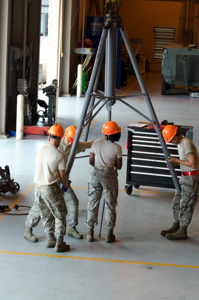 Aerospace Ground Equipment maintainers assemble a 30-ton aircraft jack at the AGE dispatch facility on Hurlburt Field Fla., June 4, 2013. The jacks are used to lift aircraft for tire changes and other maintenance.
(U.S. Air Force Photo / Staff Sgt. John Bainter)
