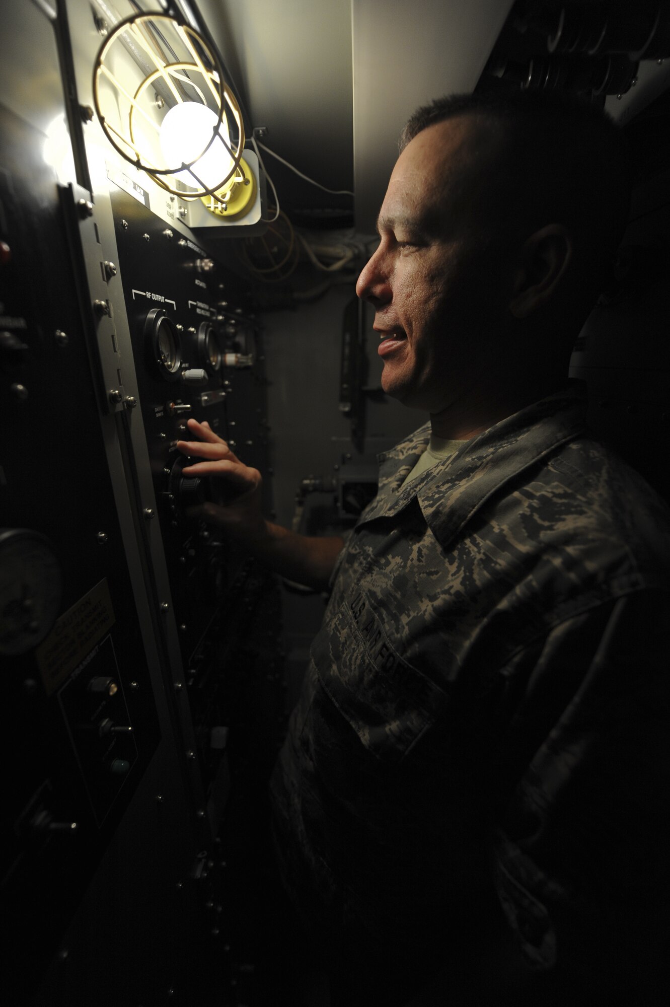 U.S. Air Force Tech. Sgt. Scott Aysenne, a radar maintenance technician with the 727th Expeditionary Air Control Squadron, mans the ground control system for an AN/TPS 75 radar at an undisclosed location in Southwest Asia June 6, 2013. The 727th EACS consists of the 255th Air Control Squadron from Gulfport, Miss., with augmentation from eight Air National Guard units and an Air Defense Artillery Fire Control Officer/Assistant team from 69th Air Defense Artillery Brigade, Fort Hood, Texas.  The 255th ACS has deployed four times in support of contingency operations overseas in the past ten years. (U.S. Air Force photo by Senior Airman Jacob Morgan)