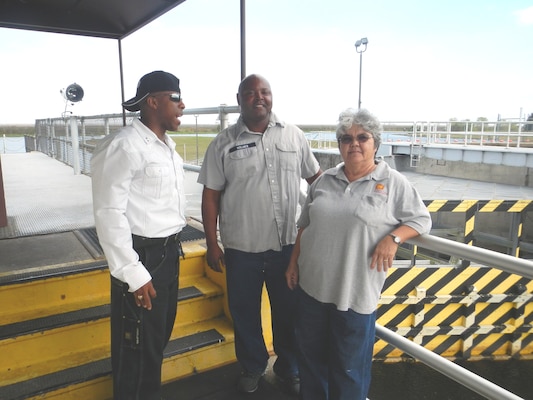 Adam Morrison (left),  Jacksonville District Equal Employment Opportunity Office, visited lock leader Pam Peralta (right) and lock operator Robert Holmes (center) at Moore Haven Lock and Dam on the Okeechobee Waterway. 