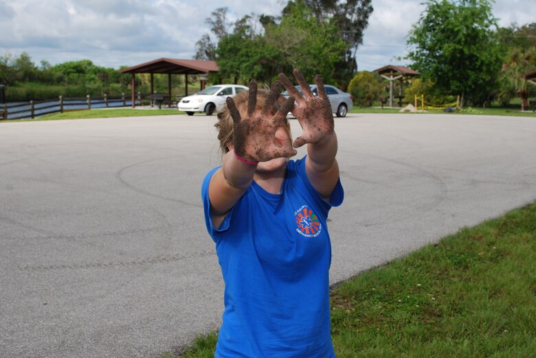 Members of the JROTC from North Fort Myers High School “got their hands dirty” at Take Pride in America Day. 