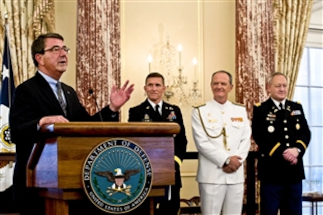 Deputy Defense Secretary Ash Carter speaks to foreign defense attaches at the State Department in Washington, D.C., June 11, 2013. Carter thanked the attaches for their dedication in strengthening ties between the U.S. and their home countries.