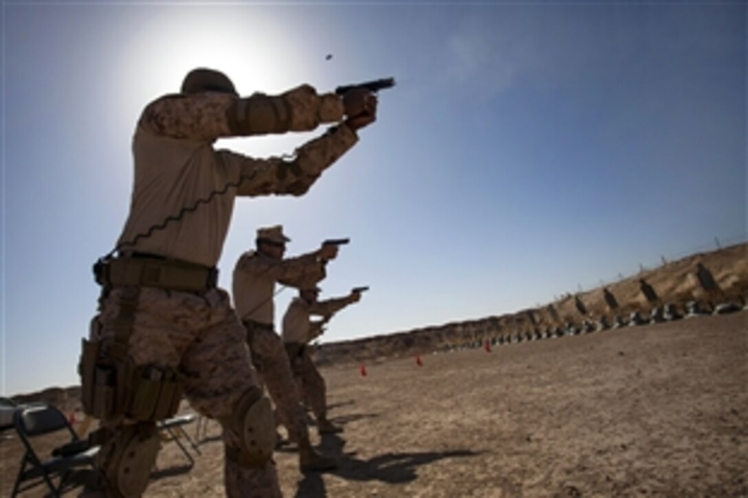 U.S. Marines conduct live-fire training on Camp Leatherneck, Helmand province, Afghanistan, June 8, 2013. The Marines trained to prepare for situations they may encounter while conducting missions in Afghanistan. The country is transitioning to Afghan-led security forces and some of the Marines are assigned to an Afghan national civil police unit.