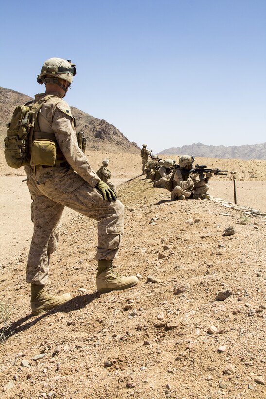 U.S. Marines assigned to Lima Company, Battalion Landing Team (BLT) 3/2, 26th Marine Expeditionary Unit (MEU), conduct live fire drills with M27 Infantry Automatic Rifles, during Exercise Eager Lion 13, June 10, 2013. Exercise Eager Lion 2013 is an annual, multinational exercise designed to strengthen military-to-military relationships and enhance security and stability in the region by responding to realistic, modern-day security scenarios. The 26th MEU is a Marine Air-Ground Task Force forward-deployed to the U.S. 5th Fleet area of responsibility aboard the Kearsarge Amphibious Ready Group serving as a sea-based, expeditionary crisis response force capable of conducting amphibious operations across the full range of military operations. (U.S. Marine Corps photograph by Lance Cpl. Juanenrique Owings, 26th MEU Combat Camera/Released)