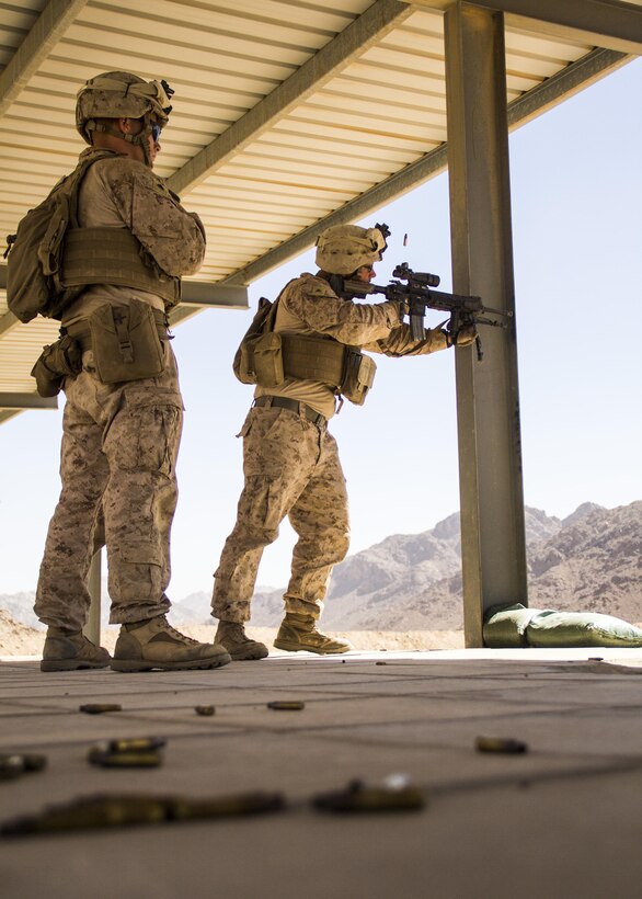U.S. Marines assigned to Lima Company, Battalion Landing Team (BLT) 3/2, 26th Marine Expeditionary Unit (MEU), conduct live fire drills with M27 Infantry Automatic Rifles, during Exercise Eager Lion 13, June 10, 2013. Exercise Eager Lion 2013 is an annual, multinational exercise designed to strengthen military-to-military relationships and enhance security and stability in the region by responding to realistic, modern-day security scenarios. The 26th MEU is a Marine Air-Ground Task Force forward-deployed to the U.S. 5th Fleet area of responsibility aboard the Kearsarge Amphibious Ready Group serving as a sea-based, expeditionary crisis response force capable of conducting amphibious operations across the full range of military operations. (U.S. Marine Corps photograph by Lance Cpl. Juanenrique Owings, 26th MEU Combat Camera/Released)