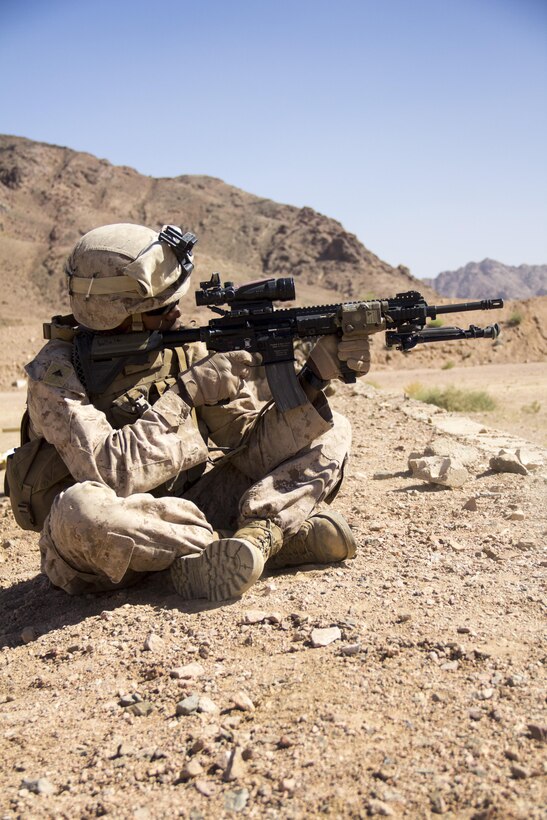 A U.S. Marine assigned to Lima Company, Battalion Landing Team (BLT) 3/2, 26th Marine Expeditionary Unit (MEU), conduct live fire drills with M27 Infantry Automatic Rifles, during Exercise Eager Lion 13, June 10, 2013. Exercise Eager Lion 2013 is an annual, multinational exercise designed to strengthen military-to-military relationships and enhance security and stability in the region by responding to realistic, modern-day security scenarios. The 26th MEU is a Marine Air-Ground Task Force forward-deployed to the U.S. 5th Fleet area of responsibility aboard the Kearsarge Amphibious Ready Group serving as a sea-based, expeditionary crisis response force capable of conducting amphibious operations across the full range of military operations. (U.S. Marine Corps photograph by Lance Cpl. Juanenrique Owings, 26th MEU Combat Camera/Released)
