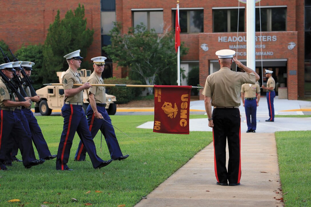 Col. Christopher Michelsen, commanding officer, Blount Island Command, Jacksonville, Fla., leads his Marines during pass and review, Friday, to give Maj. Gen. Charles L. Hudson, outgoing commanding general, Marine Corps Logistics Command, honors during a relinquishment of command ceremony at MCLC’s parade field.