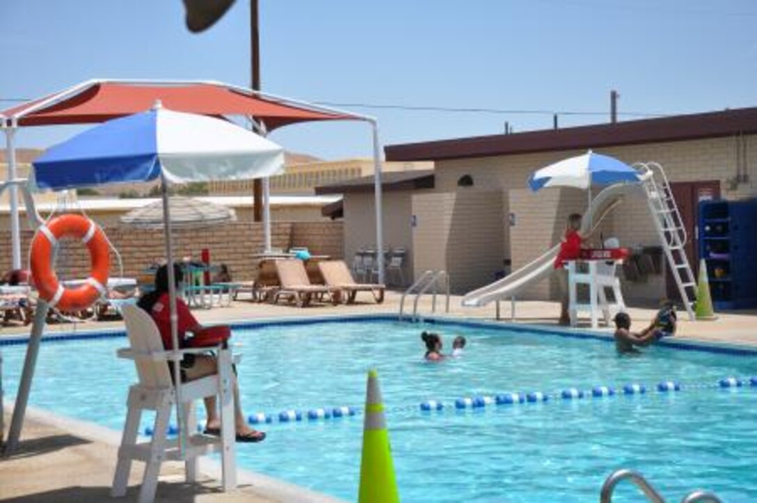 Marines, base employees and their families on Marine Corps Logistics Base Barstow, Calif., swim in the pool on base to beat the heat of the High Desert, June 1. The pool on base has at least one lifeguard on duty at all times to ensure the rules of the pool are being followed and to ensure the safety of its patrons.


