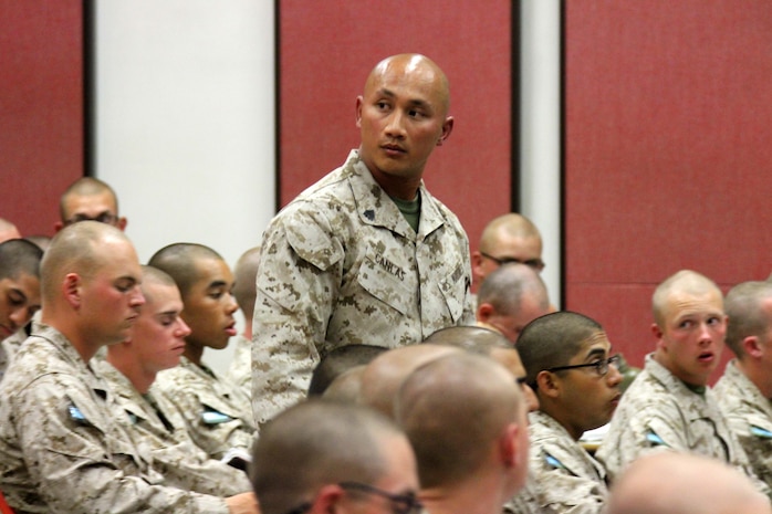 Sergeant Gersom Canales, an academic instructor, Instructional Training Command, Support Battalion, listens to a recruit answer a question during the Terrorism Awareness class aboard Marine Corps Recruit Depot San Diego, June 3.  Academic instructors are trained drill instructors selected to teach recruits various Marine Corps subjects. 