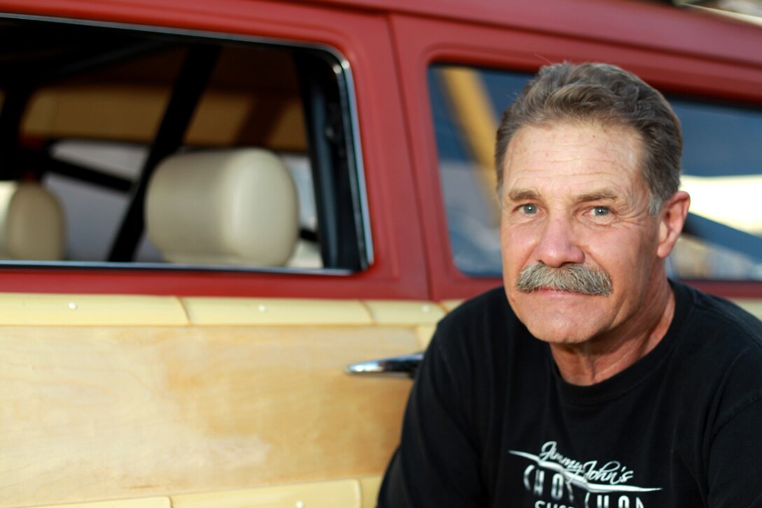 Jimmy Rodnich is the owner of 1949 Plymouth Phantom Woody displayed at the 13th Annual  Twentynine Palms Car Show. Twentynine Palms hosted the 13th Annual Car Show and Street Fair on Highway 62 June 1. “I was driving to work one day and I found it in a field in Joshua Tree,” Rodnich said. “It was quite a ways away and I could see a split-frame windshield, that kind of gives a way an old car. The owner had it parked there since 1972. They’re not attractive cars but I chopped it, sectioned it and it turned out looking ok.”