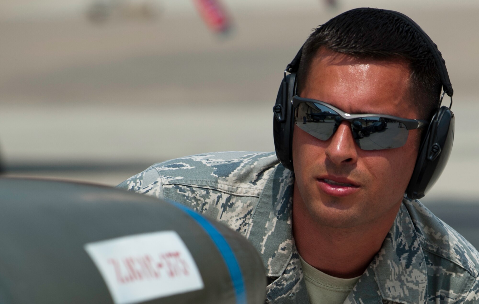 Staff Sgt. Christopher Ospina, 51st Aircraft Maintnace Squadron, 25th Aircraft Maintenance Unit loadcrew chief, Osan Air Base, Republic of Korea, inspects a GBU-31 Version 1, Joint Direct Attack Munition at Kunsan AB, ROK, June 8, 2013. Four teams competed to determine the best loaders during the 2013 Peninsula-wide weapons load crew competition. (U.S. Air Force photo by Senior Airman Armando A. Schwier-Morales)