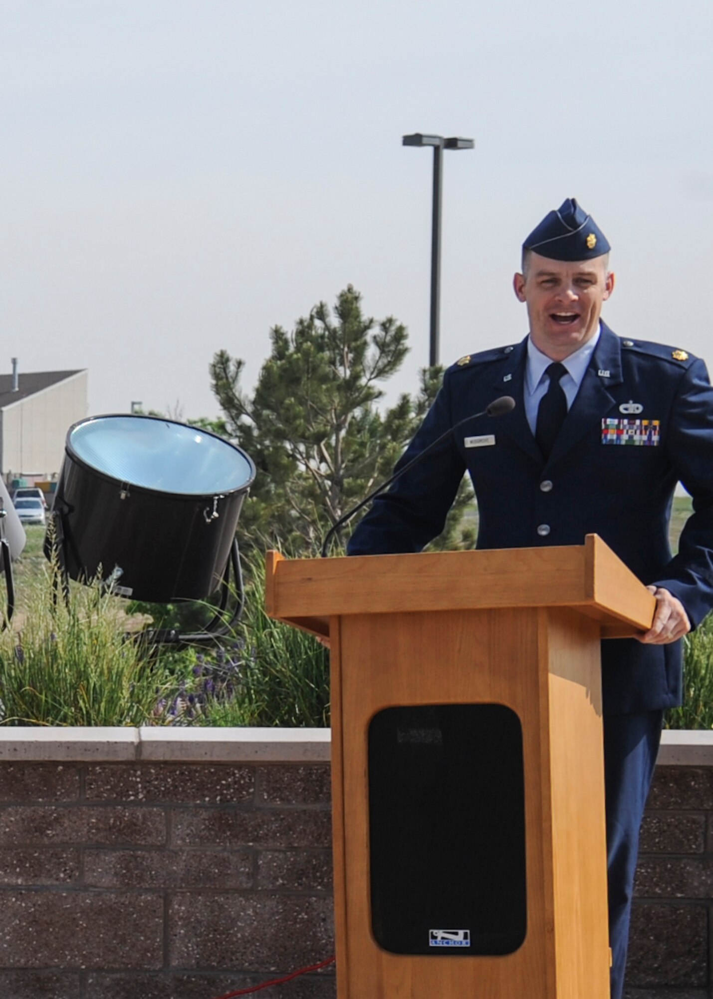 Maj. Nicholas Musgrove, 460th Logistics Readiness Squadron commander, talks to attendees of the 460th LRS change-of-command ceremony June 13, 2013, on Buckley Air Force Base, Colo. Musgrove has served 14 years as a logistician at the squadron, wing and staff levels. (U.S. Air Force photo by Staff Sgt. Christopher Gross/Released)
