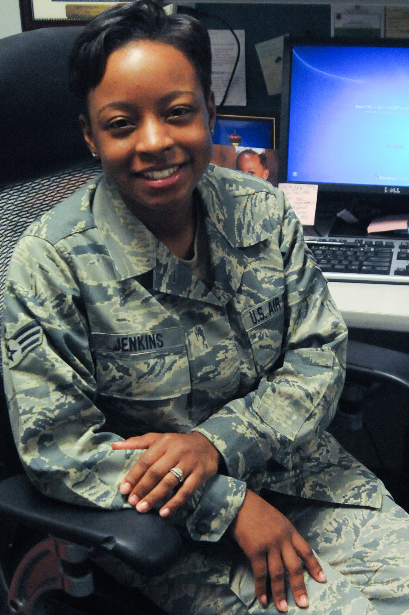 Senior Airman Ashley Jenkins, a services specialist with the 139th Services Flight, poses for a photo June 6, 2013, at Rosecrans Air National Guard Base, Mo. (U.S. Air National Guard photo by Airman 1st Class Katherine Kelly)