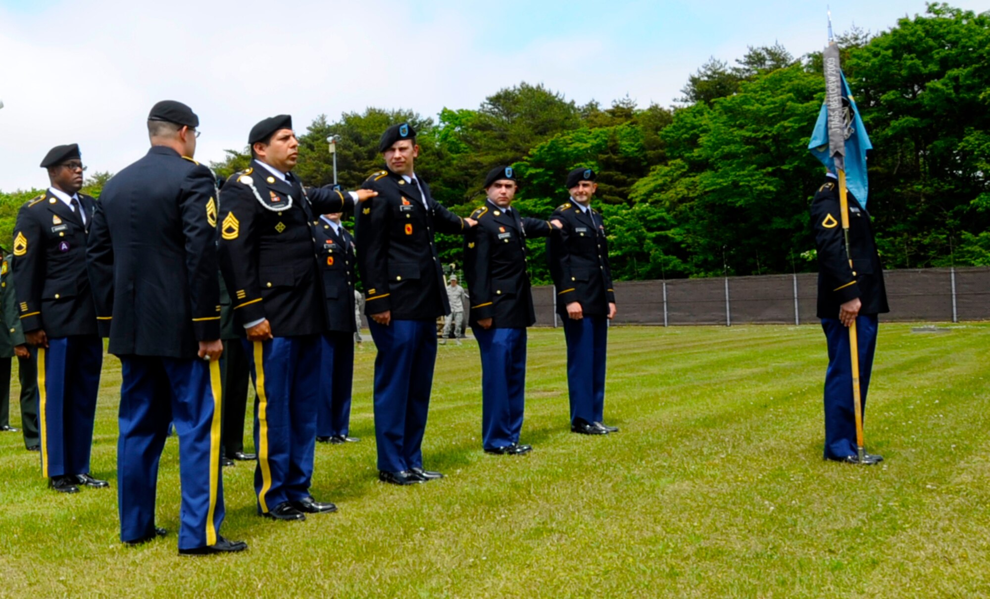 U.S. Army soldiers of the Joint Tactical Ground Systems detachment perform an Army Service Uniform inspection in honor of the service’s 238th birthday at Misawa Air Base, Japan, June 13, 2013. The JTAGS detachment’s mission is to provide early warning of theater ballistic missile threats across the pacific region. (U.S. Air Force photo by Airman 1st Class Kenna Jackson)