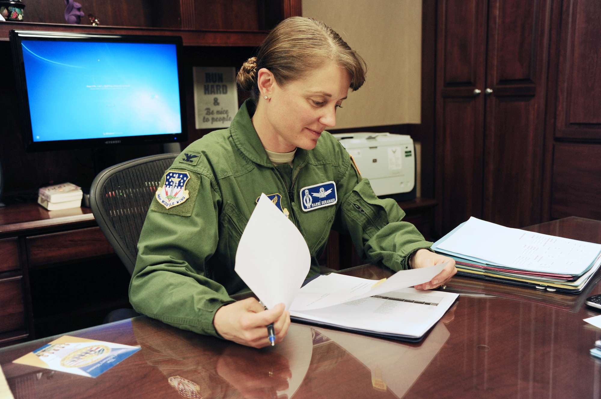 Col. Marné Deranger, 341st Missile Wing vice commander, finishes up some paperwork in her office June 7. Deranger is Malmstrom’s 45th vice commander, and gained the position in April. (U.S. Air Force photo/Senior Airman Katrina Heikkinen)