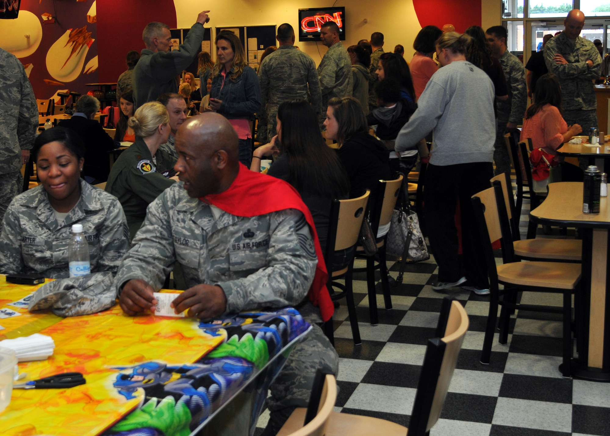 Members of Team Mildenhall attend a Hearts Apart dinner June 12, 2013, at the bowling alley on RAF Mildenhall, England. Hearts Apart dinners are a way for families of deployed service members to connect with one another. (U.S. Air Force photo by Airman 1st Class Kelsey Waters/Released) 