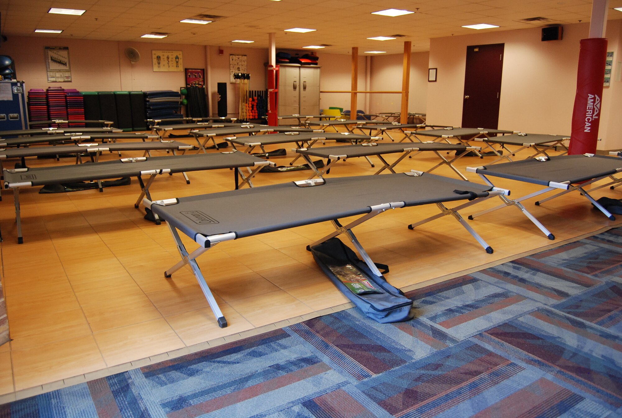 PETERSON AIR FORCE BASE, Colo. – The 21st Space Wing established a temporary shelter at the Peterson Fitness and Sports Center, building 560, to provide relief for service members and their families displaced by the wildfires burning in Colorado June 12. The shelter can accommodate approximately 100 people and is open to any person with base access. (U.S. Air Force photo/Michael Golembesky)