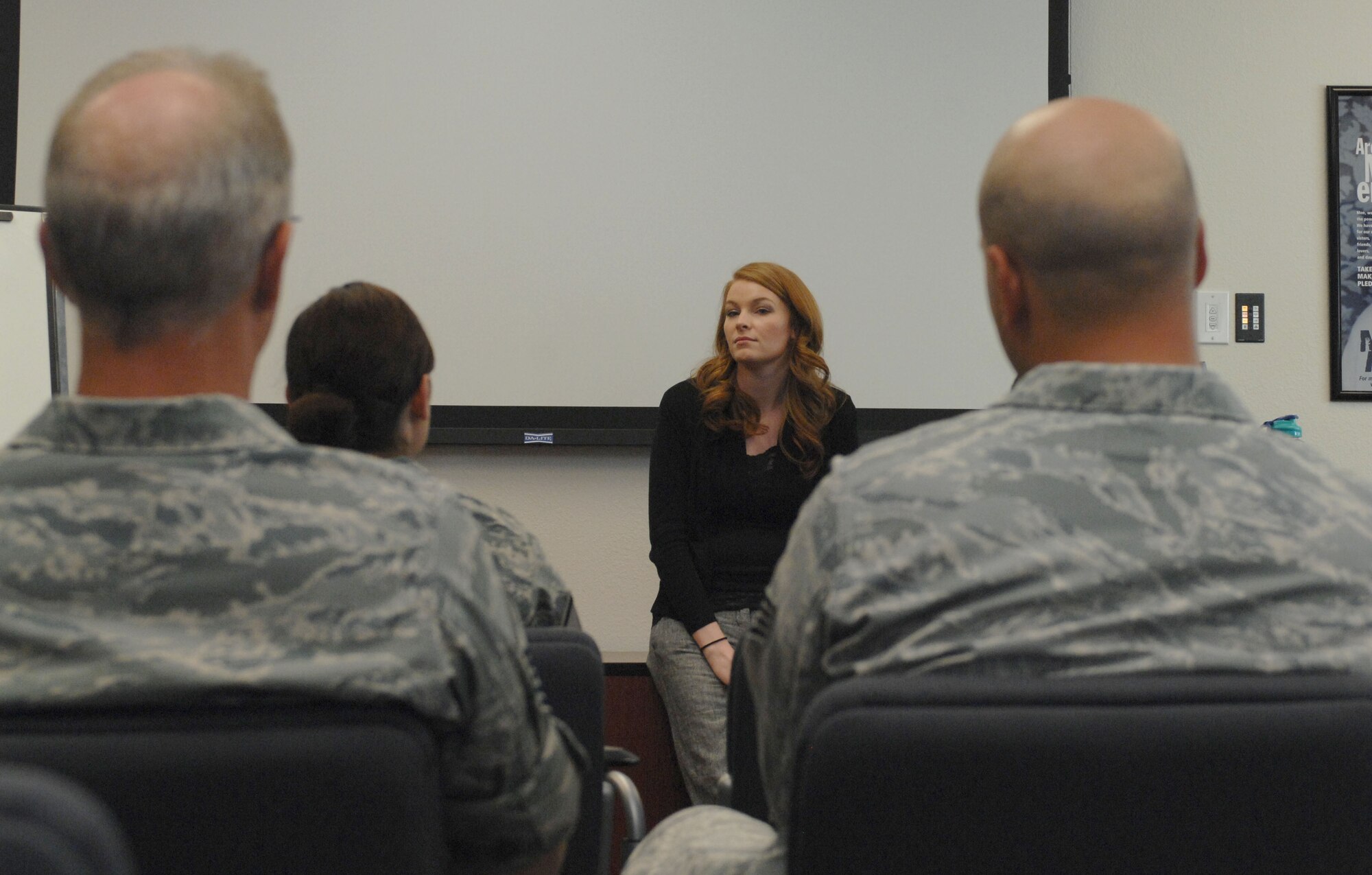 Amanda Henderson, 355th Contracting Squadron contract specialist, conducts a Sexual Assault and Prevention Training course at Davis-Monthan Air Force Base, Ariz., June 13, 2013. Henderson is a victim advocate, someone who provides essential support, liaison services and care to a sexual assault victim.