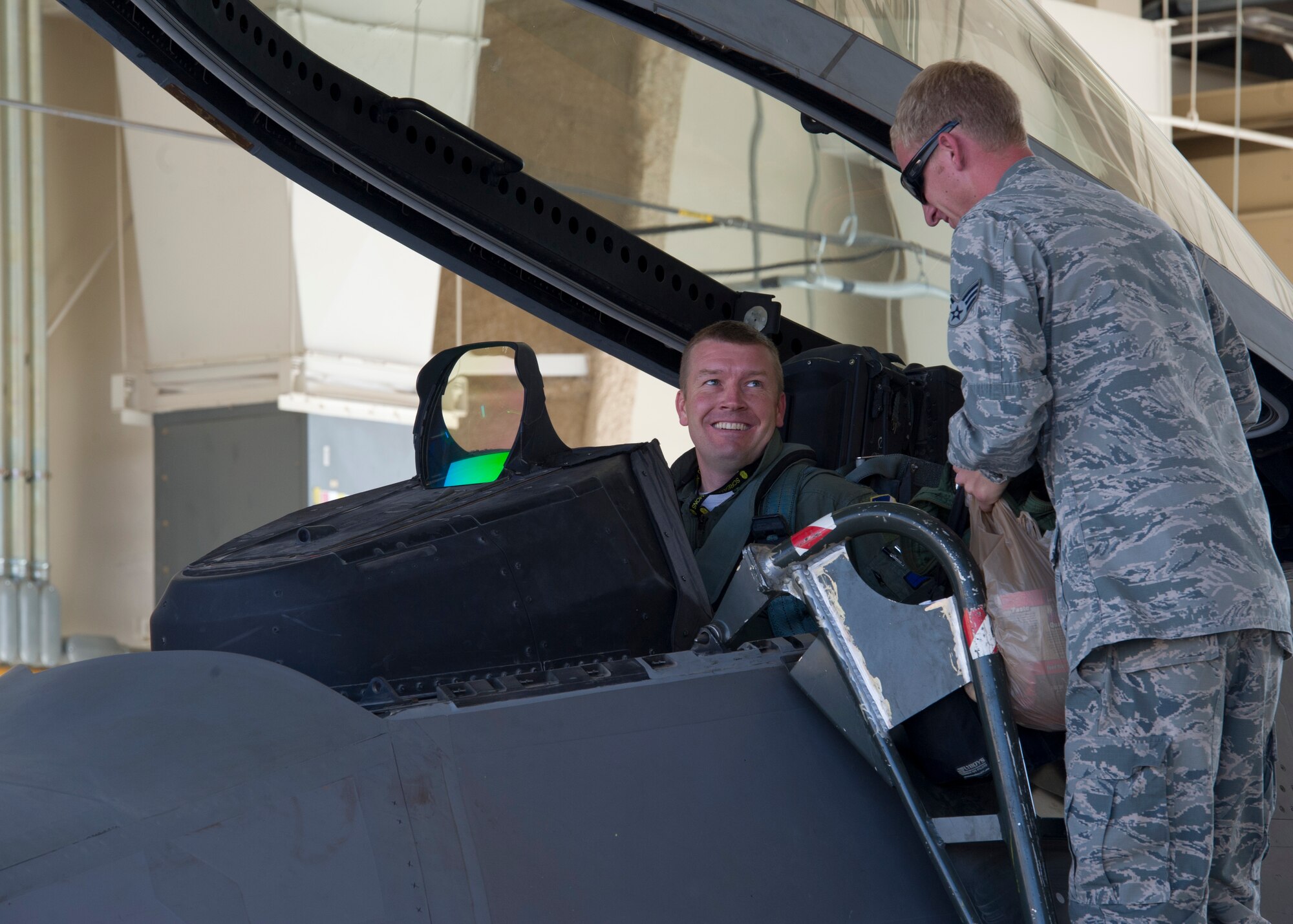 Lt. Col Shawn Anger, 7th Fighter Squadron commander, thanks his crew chief before preparing to taxi to the runway in a F-22 Raptor at Holloman Air Force Base, N.M., June 7. The 7th FS flew F-22s this weekend in support of Operation Noble Eagle. ONE.is the name given to the United States and Canadian military operations related to homeland security and support to federal, state, and local agencies. The ongoing operation began September 14, 2001, in response to the September 11 attacks. (U.S. Air Force photo by Senior Airman DeAndre Curtiss/Released)