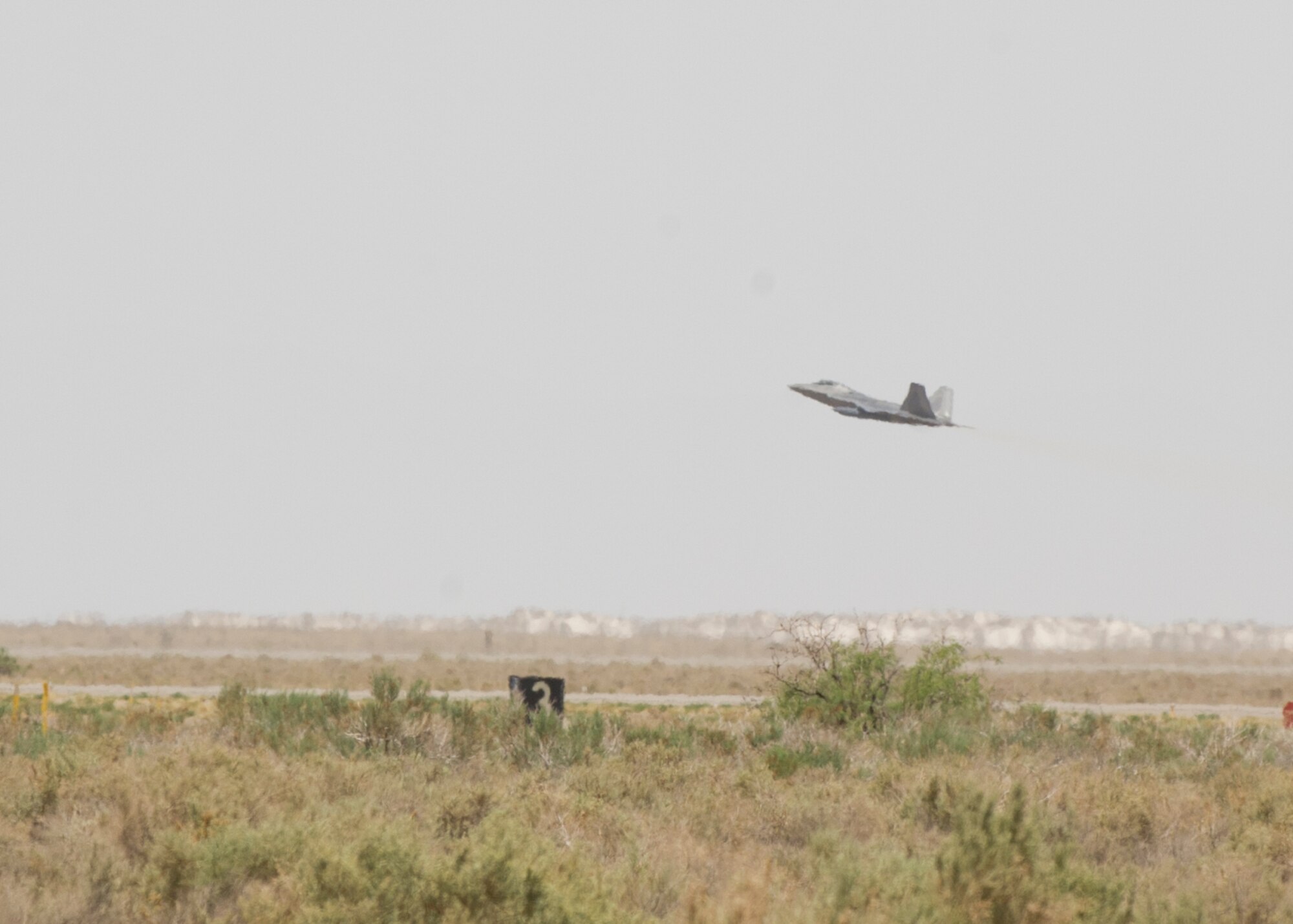 An F-22 Raptor from the 7th Fighter Squadron takes off at Holloman Air Force Base, N.M., June 8. The 7th FS flew F-22s in support of Operation Noble Eagle. ONE is the name given to the United States and Canadian military operations related to homeland security and support to federal, state, and local agencies. The ongoing operation began September 14, 2001, in response to the September 11 attacks. (U.S. Air Force photo by Airman 1st Class Chase Cannon/Released)